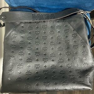 Authentic MCM Black Monogram Embossed Leather Hand/Shoulder Bag